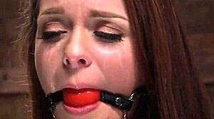 brunette handles huge dick deepthroat in bondage setup