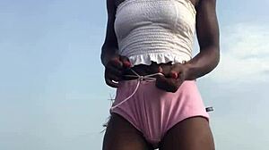 Watch crazybitch twerk on the beach?