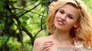 flawless lady teases her pussy after reading a book in sensual outdoor solo play by the garden