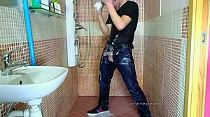 Intriguing gay shower scene with jeans and fetish elements lasting three minutes