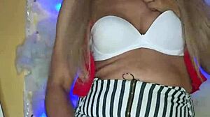 Beautiful crossdressing transsexual in makeup shows off