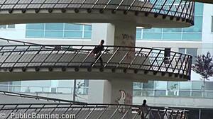 she's in the public street getting banged in a group orgy.