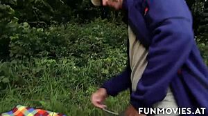 tattooed woman enjoys outdoor adventure with big jugs