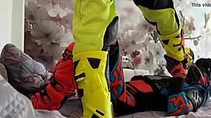 Gay motocross riders tread in boots