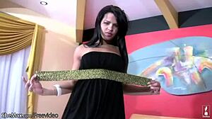 Dark haired shemale rubs strawberries on her monster cock!