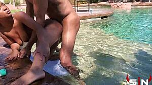 avery jane enjoys a swim in the pool