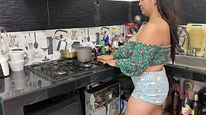my stepmom gets hot seeing me in the kitchen so i please her to fuck me hard