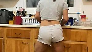 Anna Maria says, 'Watch me dance while doing dishes, part two.'