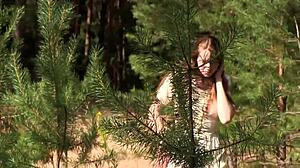 Nicole strips naked outdoors, embracing nature with open arms, amazing!