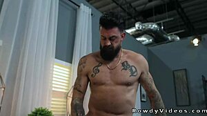 Tattooed muscle hunk trains newbie in anal session.