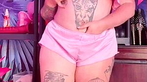 Teasing In Silk Pajamas With Huge Tattoo And Natural Tits