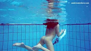 Horny teen gets naked fast by the pool, showing her tight pussy