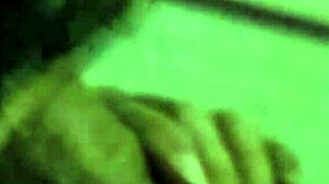 Latina gives a nocturnal blowjob to her lover in the dark bedroom.