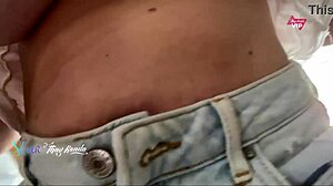 Hot wife flashes big tits while shopping without bra.