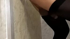 She indulges in passionate sex with her dildo in the steamy bathroom, exploring her deepest desires