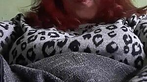 Want to see this redhead wife's hungry pussy and scarlet nails in action?