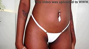 Beautiful 19-year-old ebony Jenny Pretinha takes on two huge cocks.