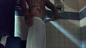 stroking big tattooed white dick in shower
