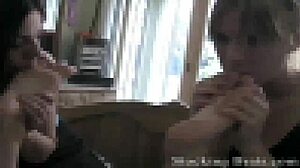 In this bdsm fetish scene, two lesbians in stockings engage in a threesome with foot play