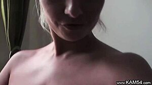 Kam54, horny milf with natural big tits, rips clothes and exposes herself on sofa for cam orgasm!