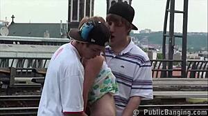18 year old blond in public threesome at train station