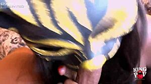 Masked beauty takes rough throat fucking backstage. Big black cock fills her mouth.