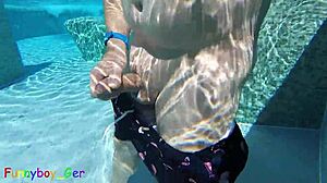 Gay guy sneakily jerks fat cock in public pool! 🥵