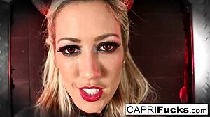 capri, the sexy devil, masturbates with big tits and ass