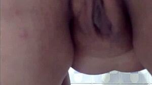 Hidden cam shows mature latina flashing pussy in Lima hotel bathroom