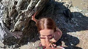 Hot brunette meets a stranger on a public beach.