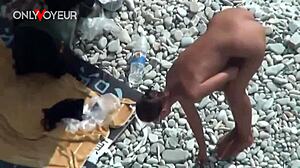 beach voyeur couple with babe naked and buttplug in public