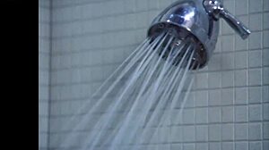 Sexy ebony girl undresses in steamy bathroom scene