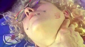 Slut drips red, cums with toy at party.