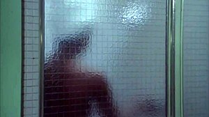 Sexy ebony girl undresses in steamy bathroom scene