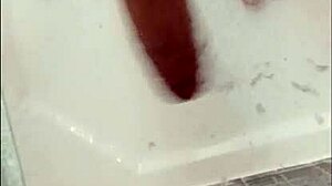 hey, i'm showering my dick with this muscular blonde bodybuilder, her blue eyes watching