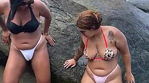 Hey, we're the hairy girls getting wild on the beach with swingers!