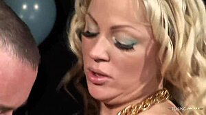 Two stunning blonde milfs take turns riding the big dick passionately