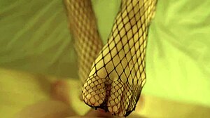 she teases with fishnet footjob, i cum on her ass