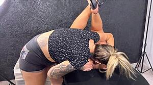 tattoo artist licks bodybuilder client’s ass till she bursts