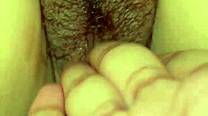 Chubby Asian amateur fingers her tight wet pussy in homemade clip