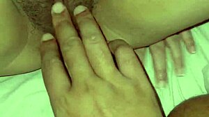 Chubby Asian amateur fingers her tight wet pussy in homemade clip