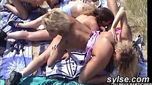 French lesbians devour each other on public beach with friends