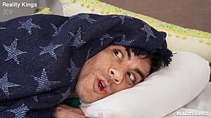 black short-haired amateur licks pussy in bedroom shorts.