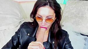 Hot milf makes blowjob in glasses for homemade fun.