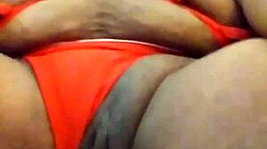 Ooh, The Sexy Ebony Woman With Tattoo Performs Actions.