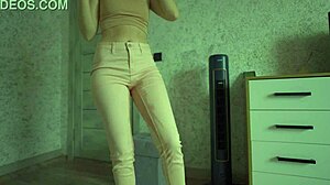 Female desperate to pee wets her jeans and panties.