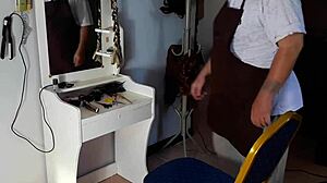 At the nude barbershop, the hairdresser convinces a curvy lady to undress for a wild haircut scene.