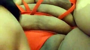 Ooh, The Sexy Ebony Woman With Tattoo Performs Actions.