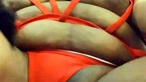 Ooh, The Sexy Ebony Woman With Tattoo Performs Actions.