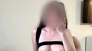Oriental hottie gets big load of cum on het titties